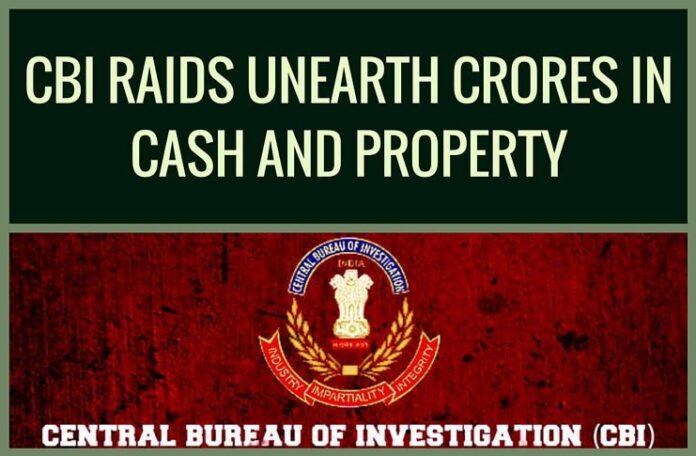 Raids on IRS officer, crores in cash and property unearthed