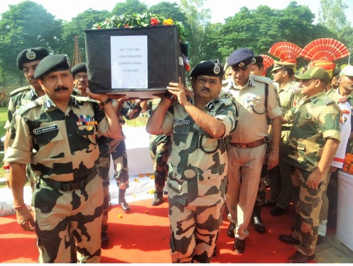 Special DG Arun Kumar along with IG,BSF Jammu frontier DK Upadhyay escorting coffin of BSF Constable Gurnam Singh on his last journey in Jammu