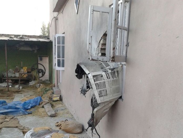 Wall of a house was pierced by a mortar shell in RS Pura sector