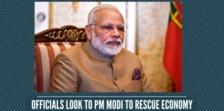 Officials look to PM Modi to rescue economy
