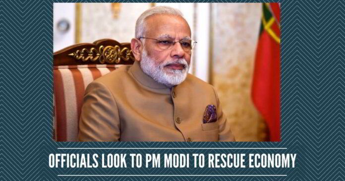 Officials look to PM Modi to rescue economy