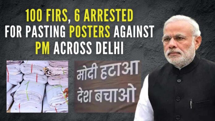 Police seized a van carrying around 2,000 posters and arrested six people